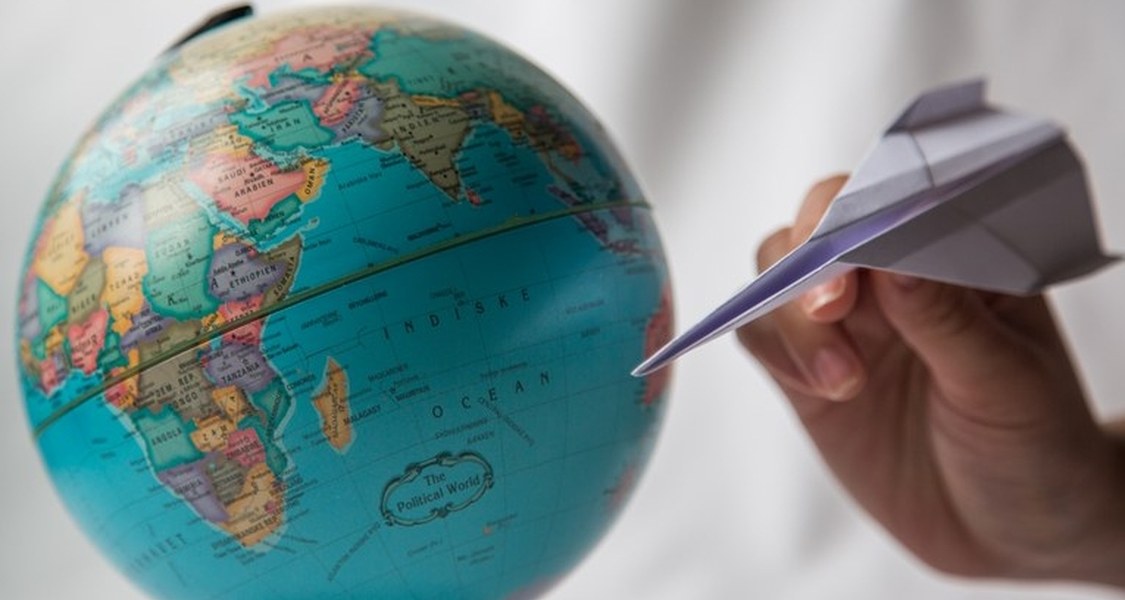 globe and paper plane