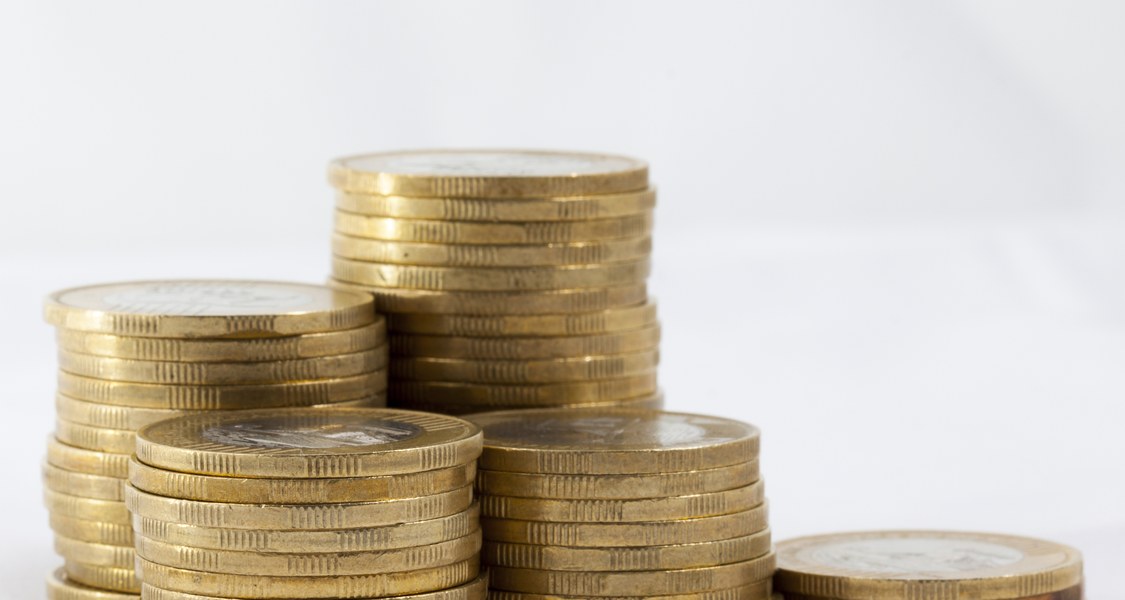 Close-up view of a pile of euro coins