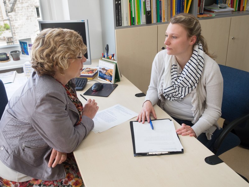 A student in a consultation with a student advisor at the department.